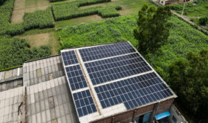 Rooftop solar power plant with rows of photovoltaic panels - Singla