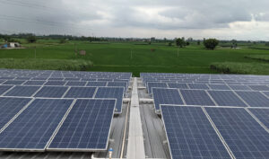 Large solar power plant with rows of photovoltaic panels - Pragathi