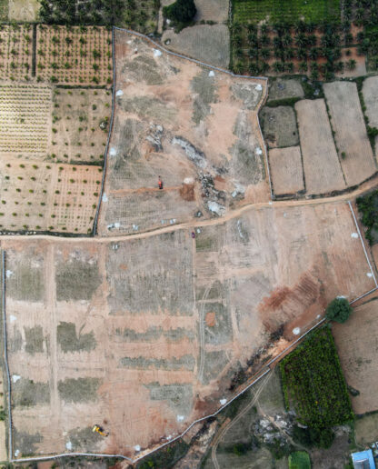 Aerial view of cleared land prepared for a solar plant project - Tiptur
