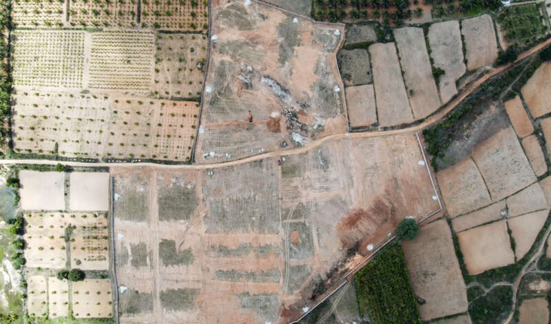 Aerial view of cleared land prepared for a solar plant project - Tiptur